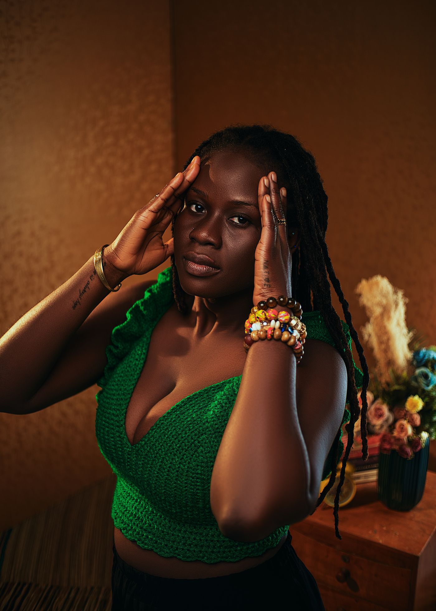 Warm-toned locs portrait